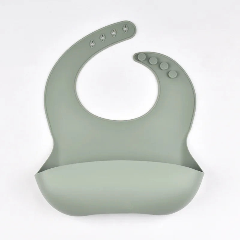 Bavoir en silicone imperméable et souple pour bébé, réglable sur 4 positions, idéal pour les nouveau-nés. Isole les aliments, protège de la saleté et de la salive.