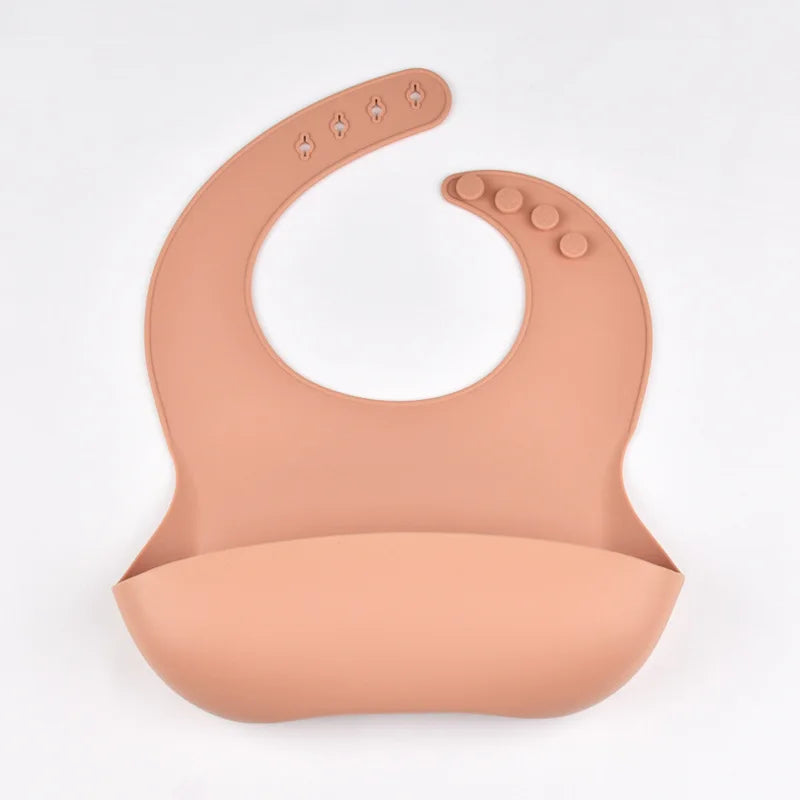 Bavoir en silicone imperméable et souple pour bébé, réglable sur 4 positions, idéal pour les nouveau-nés. Isole les aliments, protège de la saleté et de la salive.