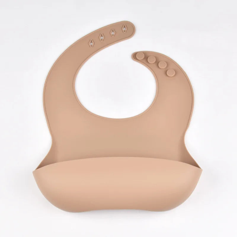 Bavoir en silicone imperméable et souple pour bébé, réglable sur 4 positions, idéal pour les nouveau-nés. Isole les aliments, protège de la saleté et de la salive.