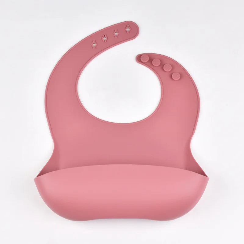 Bavoir en silicone imperméable et souple pour bébé, réglable sur 4 positions, idéal pour les nouveau-nés. Isole les aliments, protège de la saleté et de la salive.