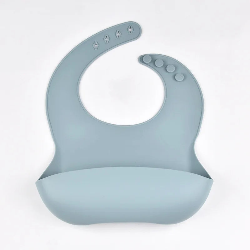 Bavoir en silicone imperméable et souple pour bébé, réglable sur 4 positions, idéal pour les nouveau-nés. Isole les aliments, protège de la saleté et de la salive.